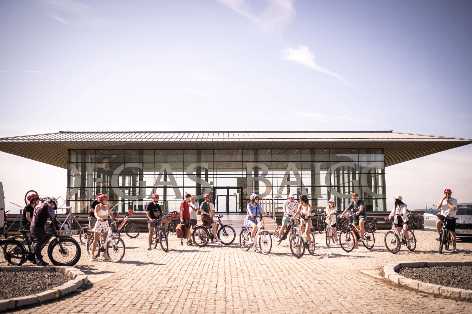 The group with bicycles outside the winery